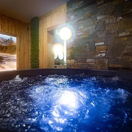 Dworek Nad Jalowcami Z Jacuzzi 比利但耶克